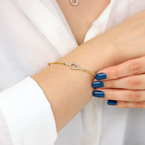 Bransoletka z dwukolorowego złota 750 z cyrkoniami  5,57 g