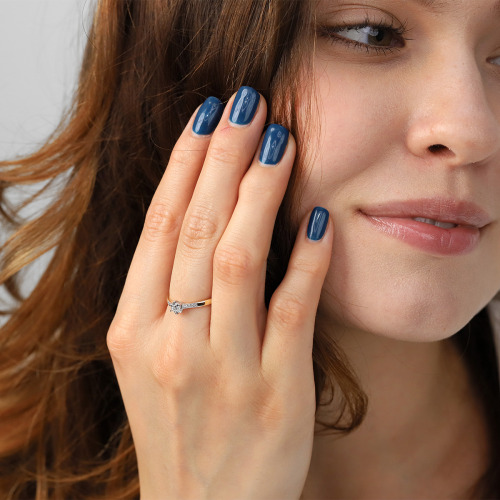 Pierścionek z żółtego i białego złota 585 z diamentami 0,12 ct Si/H   1,66 g