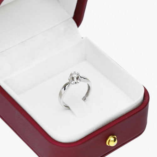 Pierścionek z białego złota 585 z brylantem 0,15 ct Si/J
