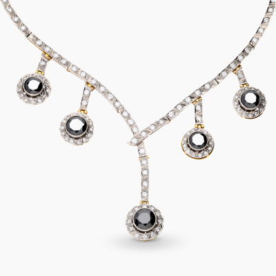 Naszyjnik żółte złoto 585 z czarnymi i białymi brylantami...