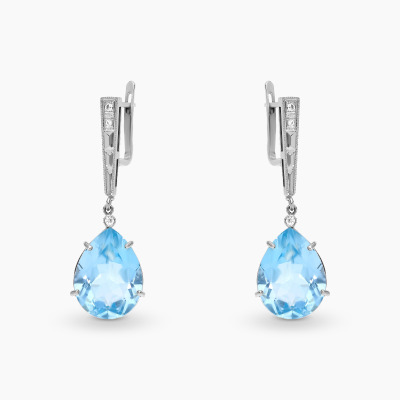 Kolczyki białe złoto 585 z topazami 19,10 ct i brylantami...