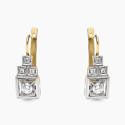 Kolczyki z żółtego i białego złota 585 z brylantami 0,52...