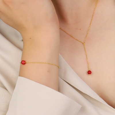 Bransoletka Sphere srebrna pozłacana splot rolo z koralem 2