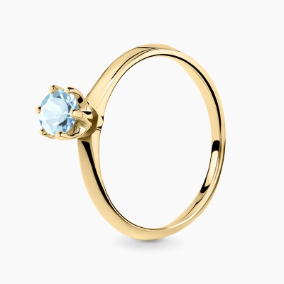 Pierścionek Torino żółte złoto 585 z topazem sky 0,61 ct...