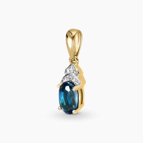 Zawieszka dwukolorowe złoto 585 z diamentami i topazem London Blue 0,57 ct