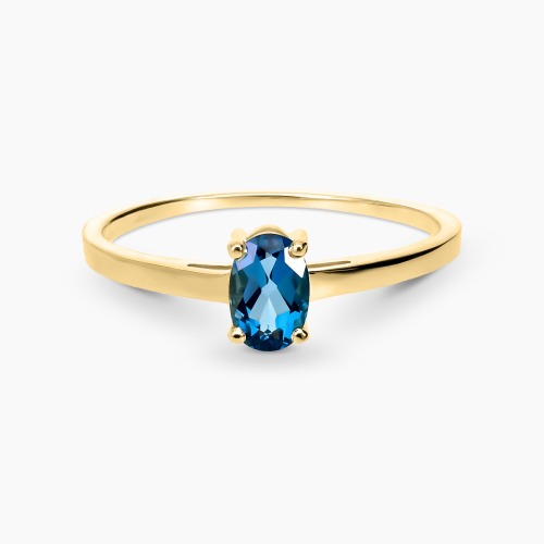 Pierścionek z żółtego złota 585 z topazem London Blue 0,63 ct