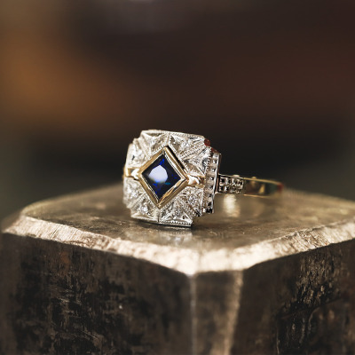 Pierścionek z dwukolorowego złota 585 z szafirem 0,45 ct... 2