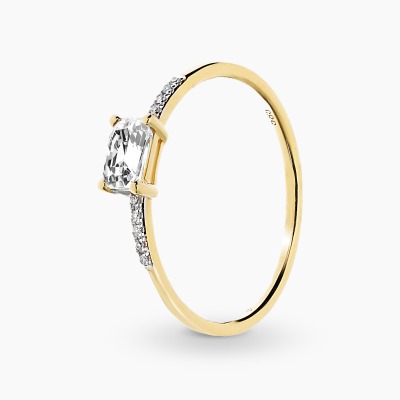 Pierścionek złoty z prostokątnym topazem 0,40 ct i...