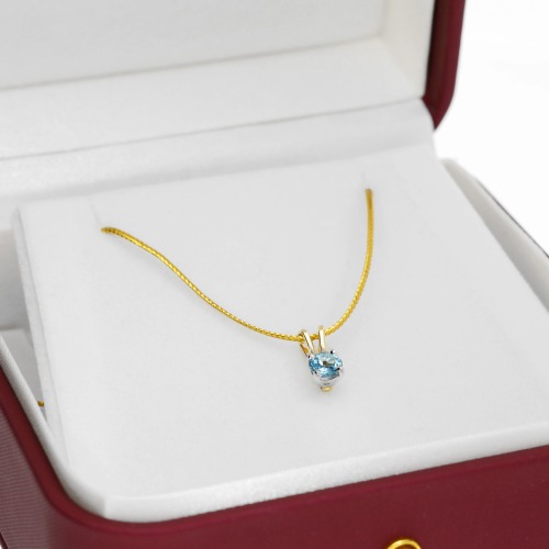 Zawieszka Sorrento z dwukolorowego złota 585 z topazem swiss 0,60 ct