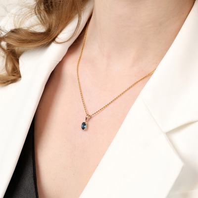 Zawieszka Livorno różowe złoto 585 z topazem London Blue 2