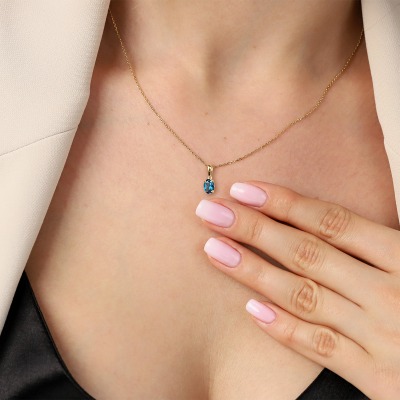 Zawieszka Livorno żółte złoto 585 z topazem London Blue 2