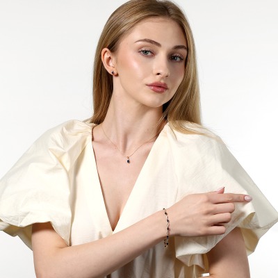 Kolczyki dwukolorowe złoto 585 z brylantami i owalnymi... 2