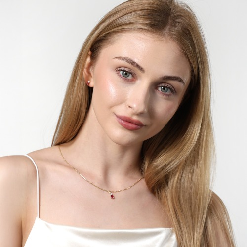 Kolczyki dwukolorowe złoto 585 z brylantami i owalnymi rubinami 0,52 ct