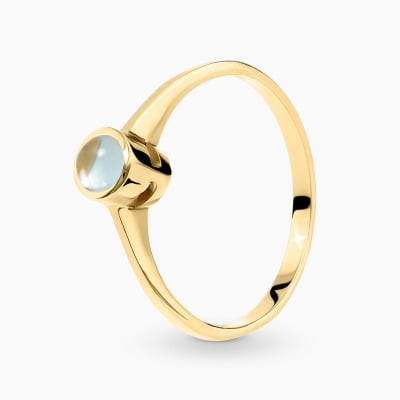 Pierścionek z żółtego złota 585 z topazem sky 0,41 ct