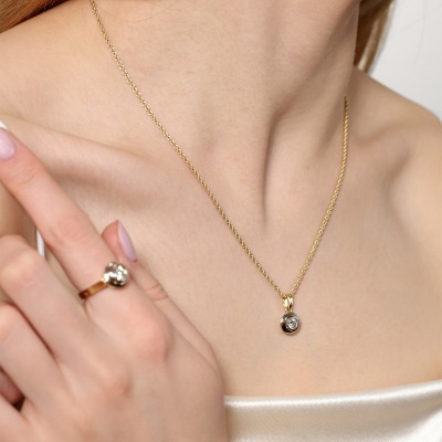 Zawieszka z żółtego i białego złota 585 z brylantem 0,23... 2