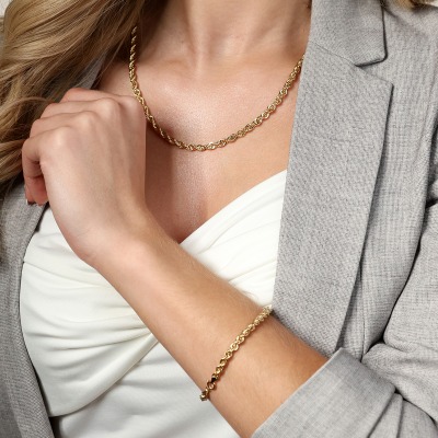 Bransoletka o bogatym splocie z żółtego złota 585 dł. 19... 2