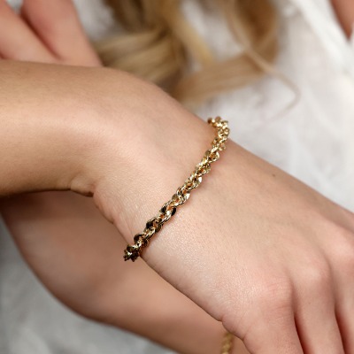 Bransoletka o ciekawym splocie z żółtego złota 585 dł. 19 cm 2