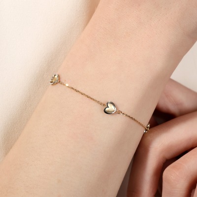 Bransoletka z żółtego i białego złota 585 z sercami dł.... 2