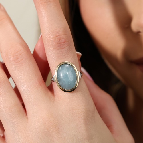 Pierścionek żółte złoto 585 z brylantami 0,08 ct i okazałym akwamarynem 10,52 ct