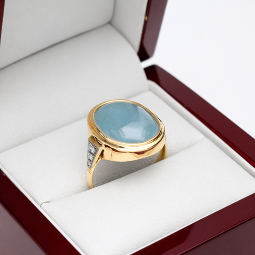 Pierścionek żółte złoto 585 z brylantami 0,08 ct i okazałym akwamarynem 10,52 ct