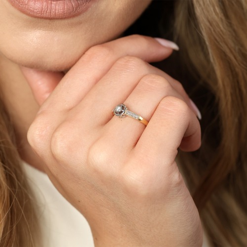 Pierścionek z żółtego i białego złota 585 z brylantami 0,12 ct Si/H