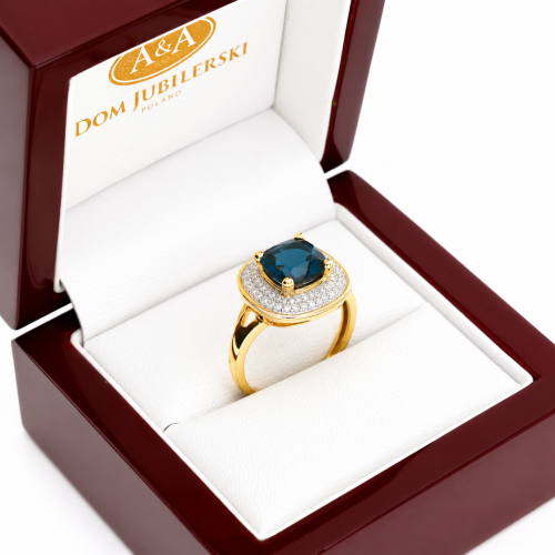 Pierścionek żółte złoto 585 z diamentami i okazałym topazem London Blue 2,97 ct