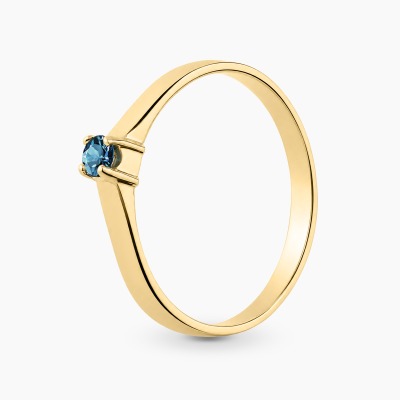 Pierścionek z żółtego złota 585 z topazem London Blue...