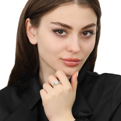 Pierścionek z dwukolorowego złota 585 z brylantami 0,64... 2