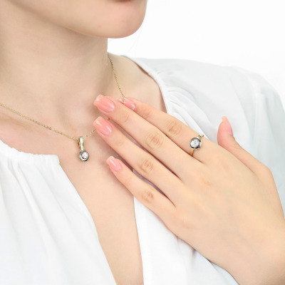 Zawieszka żółte i białe złoto 585 z brylantem 0,24 ct 2