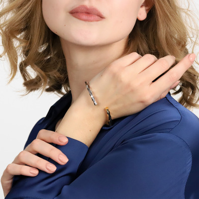 Bransoletka sztywna z żółtego i białego złota 585... 2