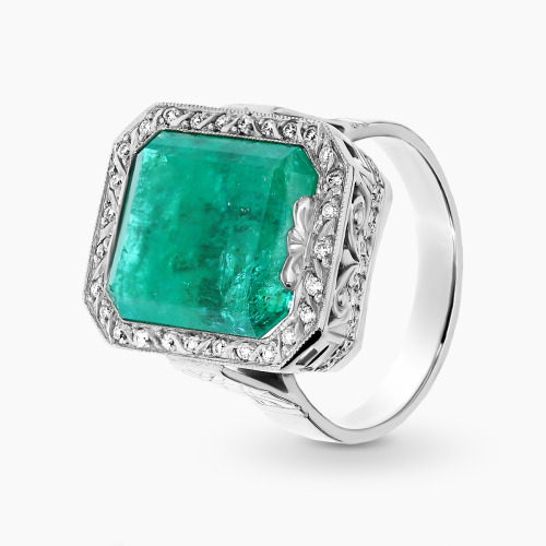 Pierścionek z białego złota 585 ze szmaragdem 8,95 ct  i brylantami 0,18 ct