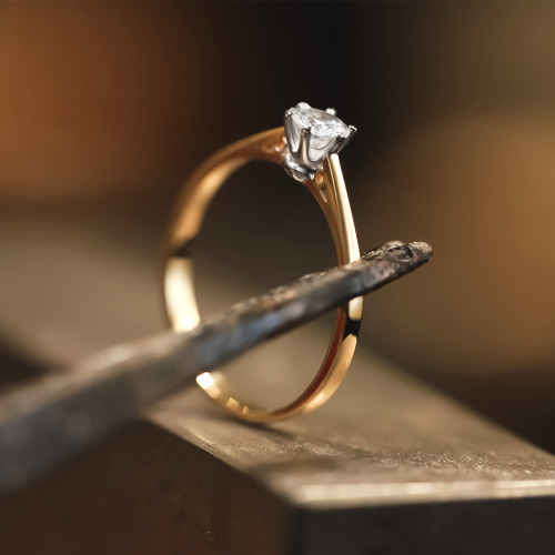 Pierścionek Siena z żółtego i białego złota 585 z brylantem 0,26 ct  1,57 g